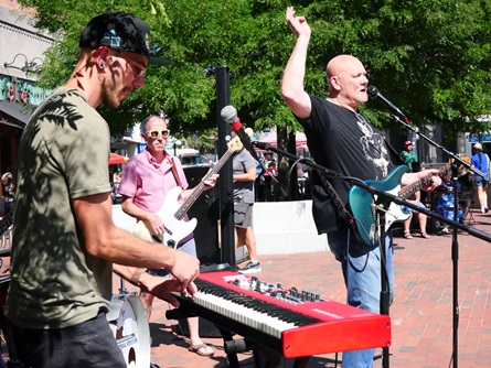 Mark Hobbs Band performs in Brattle Square during the 2026 Cambridge Porchfest.