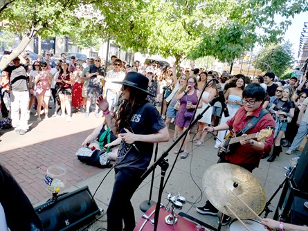Storrow Drivers perform outside Cantab Lounge on Massachusetts Avenue during the 2026 Cambridge Porchfest.