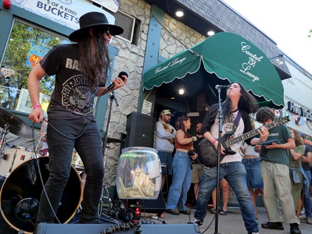Storrow Drivers perform outside Cantab Lounge on Massachusetts Avenue during the 2026 Cambridge Porchfest.