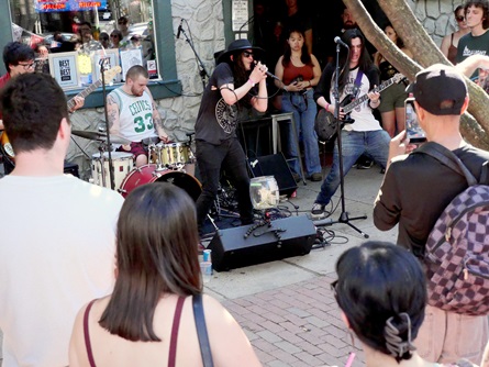 Storrow Drivers perform outside Cantab Lounge on Massachusetts Avenue during the 2026 Cambridge Porchfest.