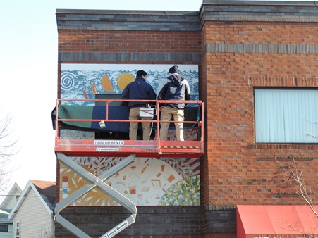 USArt prepares to de-install the mural 