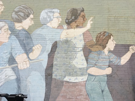 Detail of protesters in Bernard Lacasse's Beat the Belt Mural