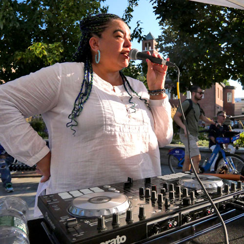 Cambridge Arts celebrated 50 years of hip-hop with “Hip-Hop After Work” at Jill Brown-Rhone Park in Central Square on Sept. 7. Imani Deal lead a dance cypher, DJ Nomadik spun (pictured), and The Bridgeside Cypher hosted a rap cypher.
