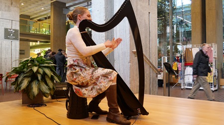 Harpist Shelley Otis at Cambridge Arts' 2022 Holiday Art Market.