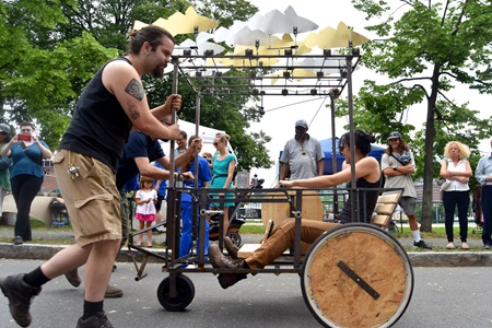 A fish-themed vehicle competes in People's Sculpture Racing at the 2018 River Festival.