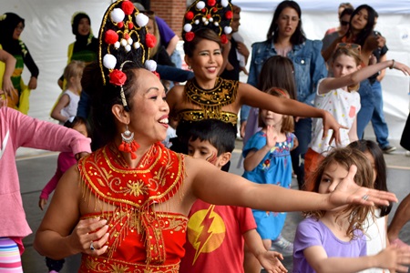 Boston Cendrawasih invites the audience onto the Interactive Dance Stage to learn the dance of Bali, Java and Sumatra at the 2019 Cambridge Arts River Festival.