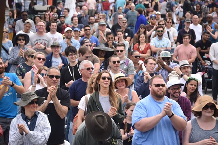 The audience claps along with the Kevin Harris Project at the Jazz, R&B, & World Music Stage during the 2019 Cambridge Arts River Festival.