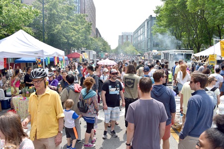 People fill Sidney Street during the 2019 Cambridge Arts River Festival.