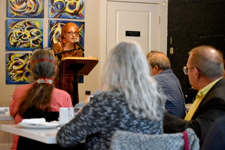 Linda Werbner speaks at the  City Night Readings Series at The Little Crêpe Café in Cambridge, May 6, 2022.