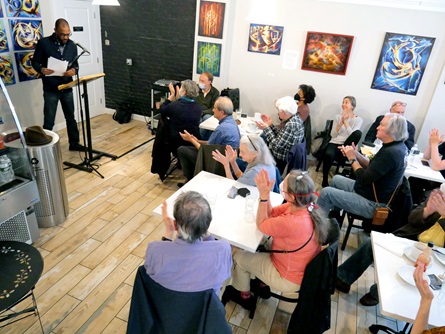 Savonne Johnson speaks at the  City Night Readings Series at The Little Crêpe Café in Cambridge, May 6, 2022.
