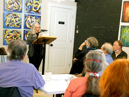 Jac-Lynn Stark speaks at the  City Night Readings Series at The Little Crêpe Café in Cambridge, May 6, 2022.