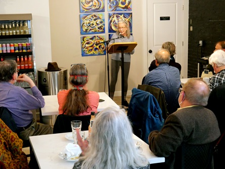 Karen Klein speaks at the  City Night Readings Series at The Little Crêpe Café in Cambridge, May 6, 2022.