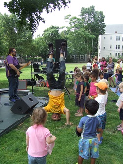 Rolie Polie Guacamole perform for a crowd of youngsters and families during Summer in the City in Cambridge.