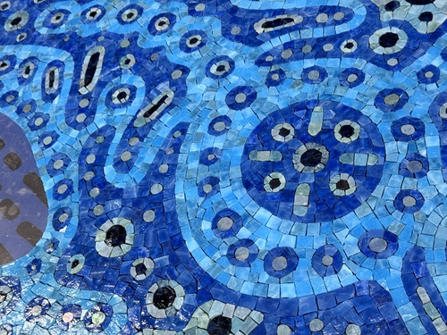 “Tranquility” (in progress). Byzantine glass smalti and hand-glazed ceramic tile being set in the studio. Photo by Cambridge Arts.