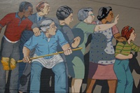 A close up of the protesters with a fresh coat of paint featured in the freshly restored Beat the Belt mural