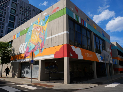 “Creative Freedom,” a 2019 mural by Chelsea artist Silvia López Chavez of Chelsea, wraps around the Franklin and Pearl streets sides of the Central Square branch library.