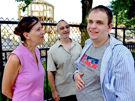 Dominic Killiany (right) with his parents Susan Cicconi (left) and Michael Killiany at Louis A. DePasquale Universal Design Playground at Danehy Park, Cambridge, August 2021.