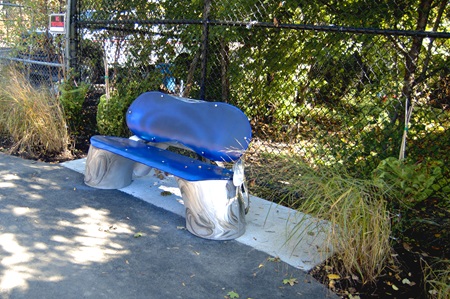 A bench from Bland Hoke's “Artesian Well – A Portal to Sacramento Park’s Past