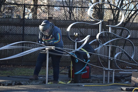 Vivian Beer reinstalls her 2012 artistic stainless steel bench 