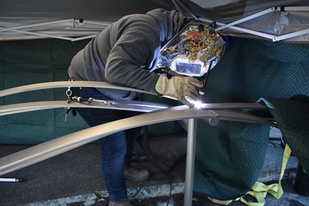 Vivian Beer welds her 2012 artistic stainless steel bench 