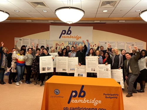 Participatory Budgeting Group Cheer for Project Winners