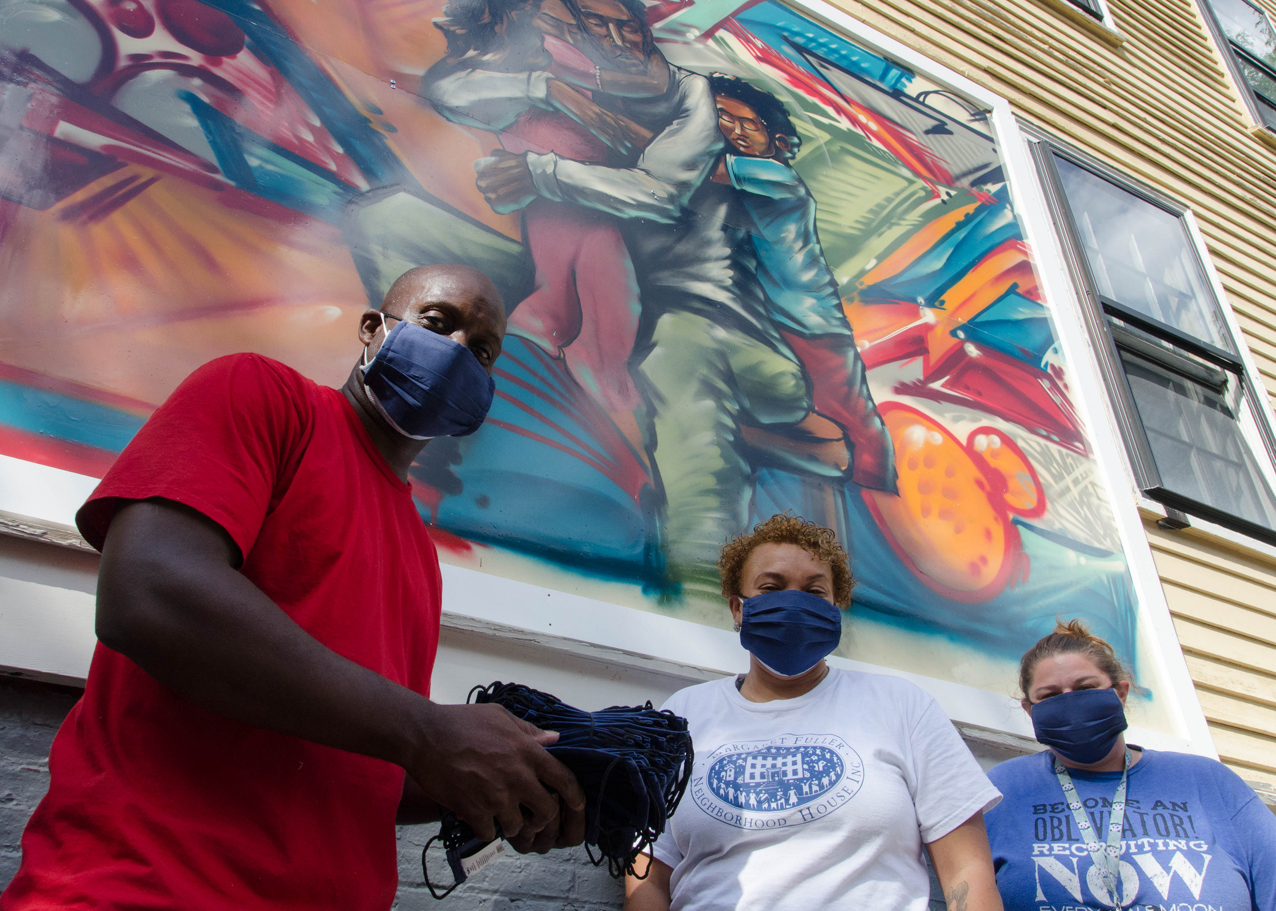 Staff and friends of Margaret Fuller Neighborhood House Distribute Masks. Photo by David Rabkin