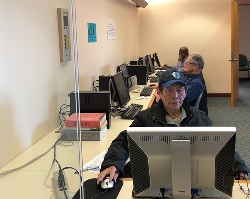 Seniors use computers at Cambridge Senior Center
