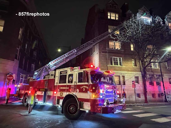 Ladder 3 set up on Bow Street with aerial ladder deployed to the fire floor - floor 4