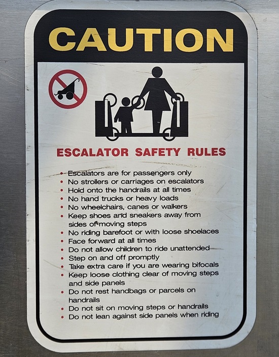 Escalator caution notes - Porter MBAT
