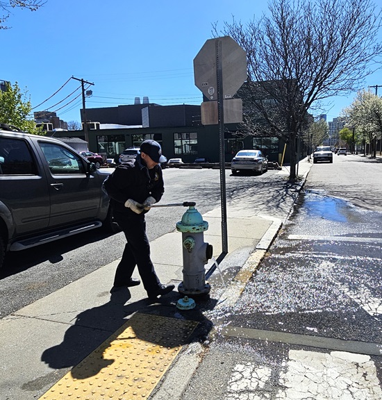 a firefighter closes the hydrant upon completion of the flow test