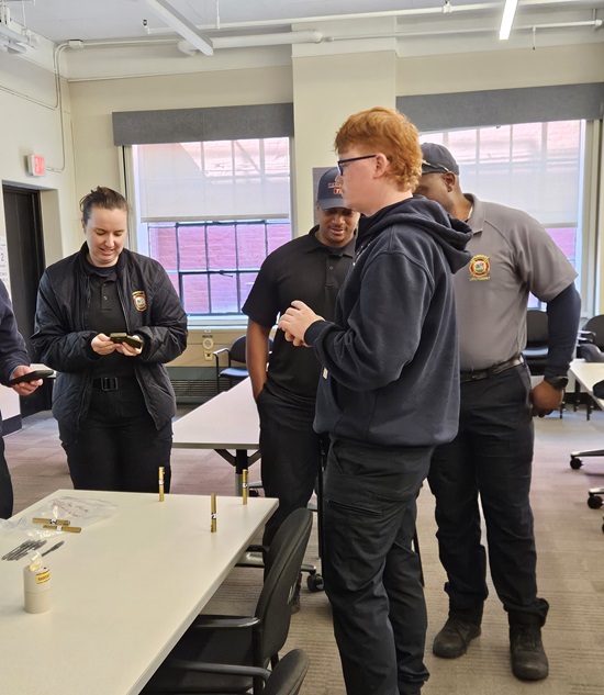 Fireifghters using various radiation meters to detect radiation in the ambient atmosphere