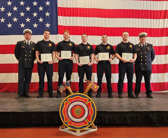 Recruit Firefighter graduation - Feb 10,2026 - five Cambridge graduates with Chief Cahill and Assistant Chief White