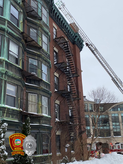 2nd alarm box 2-461 - 1137 Mass Av - Engine 2, Ladder 2, and Squad 3 working deployed on the Remington St side of the fire