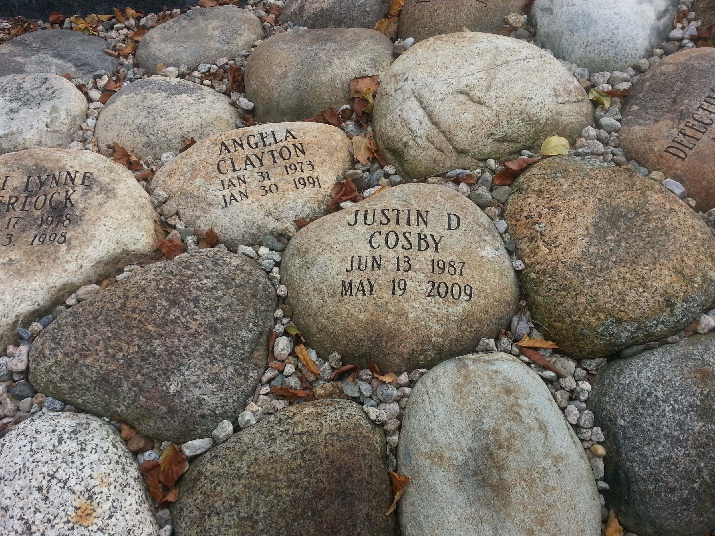 Close up of memorial stones with names
