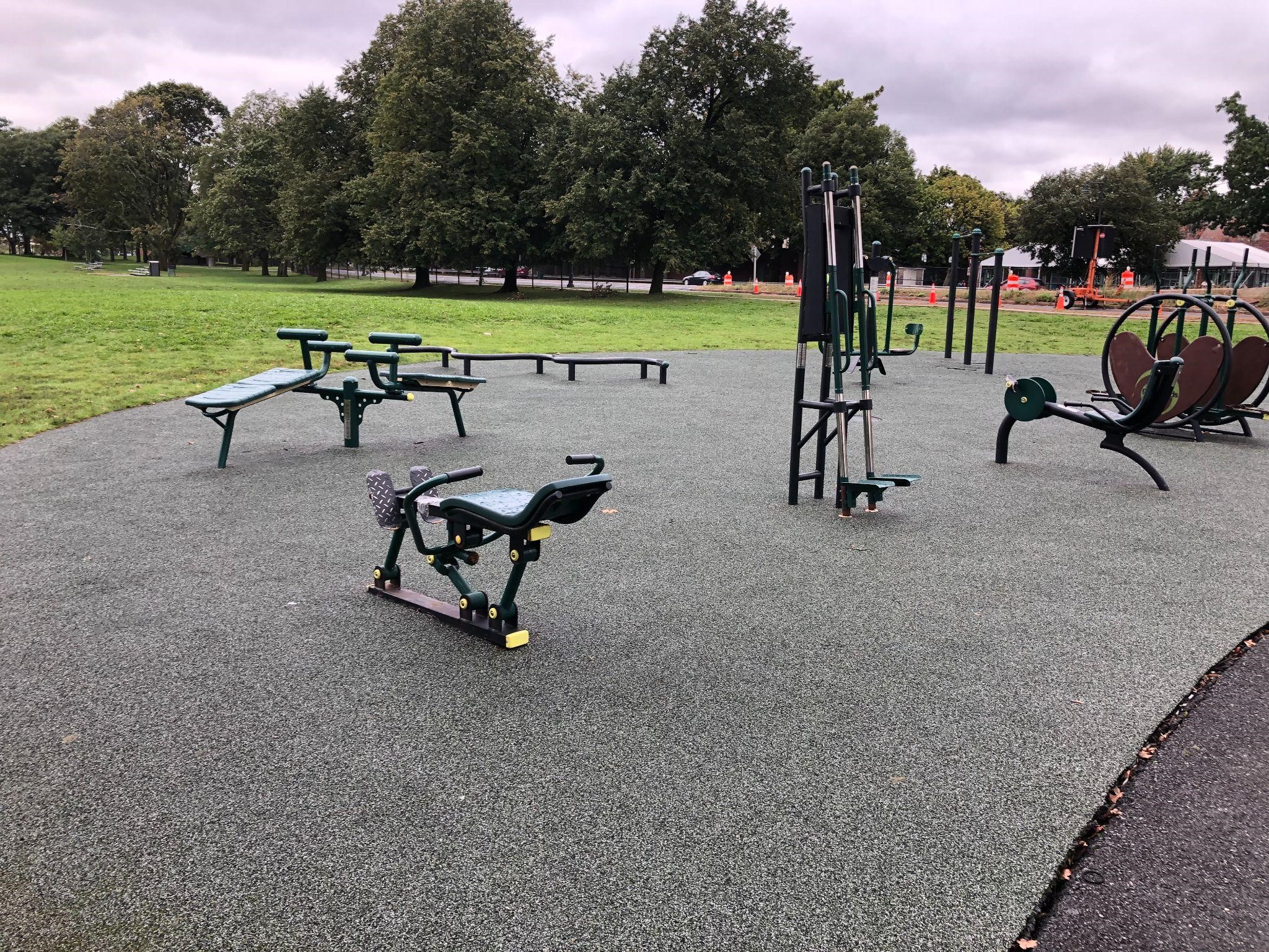 Outdoor gym with weight lifting benches