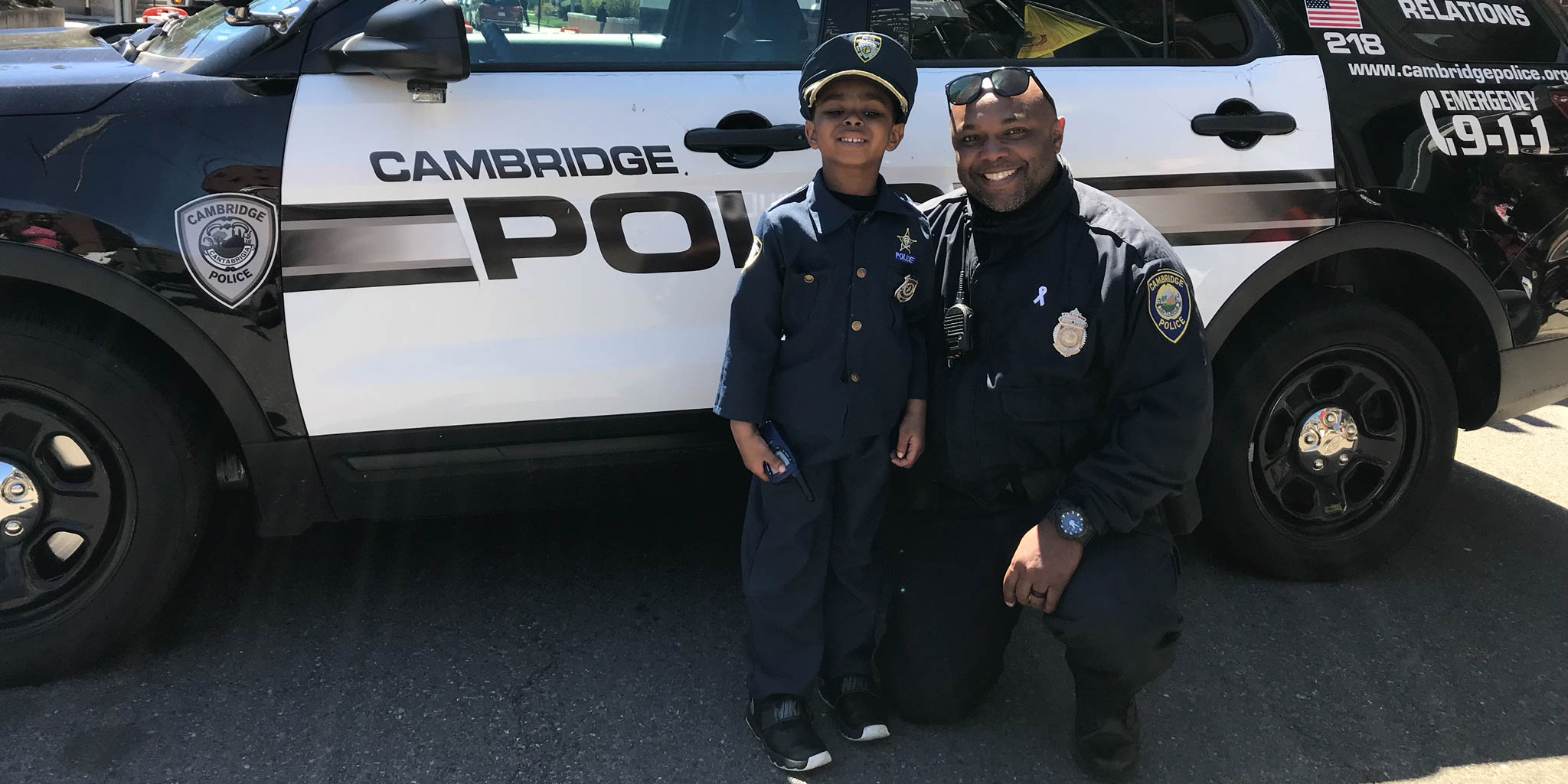 Image of Police office and child