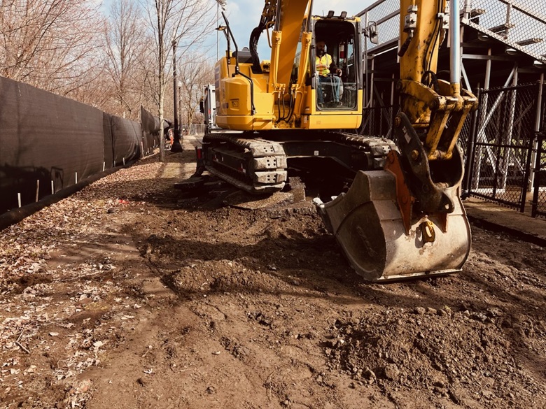 Crew removing old path pavement March 26, 2026