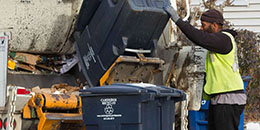 Photo of recycling bin being emptied into recycling truck