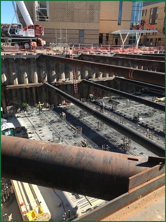Crews build a stormwater storage tank under the Tobin Montessori and Vassal Lane Upper Schools Complex, as part of the Alewife Brook sewer separation program.