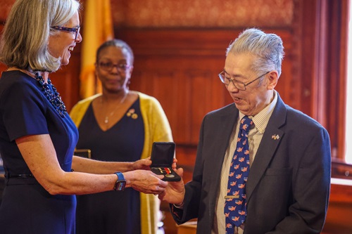 Democratic Whip Katherine Clark (MA-5) presents lifelong Cambridge resident and U.S. Army veteran, Corporal Wing “Vinny” Wong with long overdue military honors, the Army of Occupation Medal (with Germany Clasp) and the National Defense Service Medal.