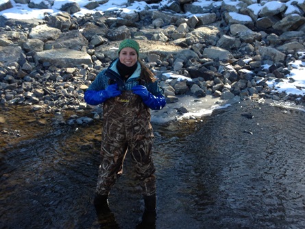 CWD staff member Katie Booras wearing camo waders by Cabelas with nitrile-blue gloves by Ben Meadows.