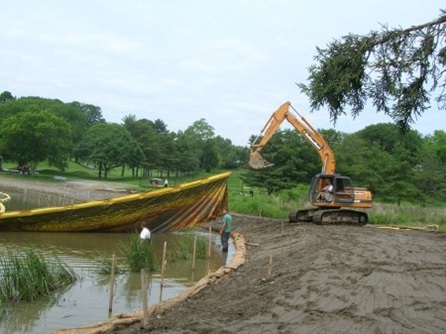Removing the silt curtain.