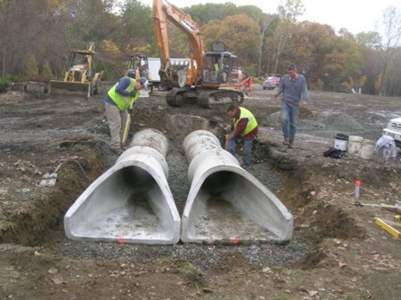 Drainage pipes placed in Lusitania Meadow.