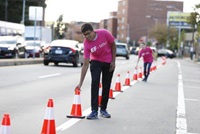 Glocal Challenge winner installing the bus priority lane on PARKing Day 2018