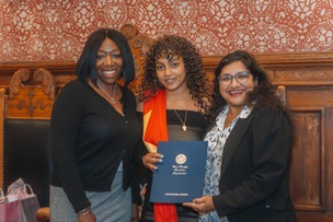 CSI Director Tawanya Garrett (left), graduate Birti, and City Councillor Sumbul Siddiqui