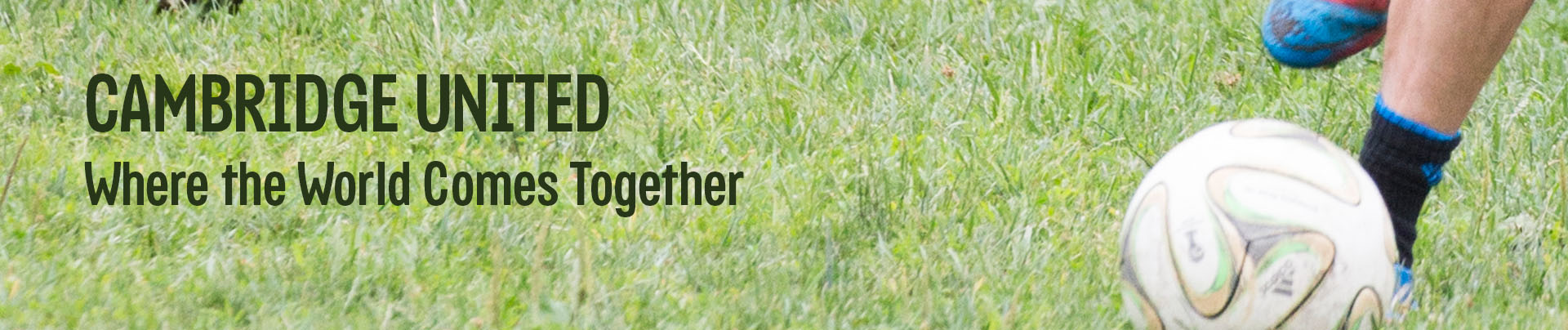Residents play soccer on a field.