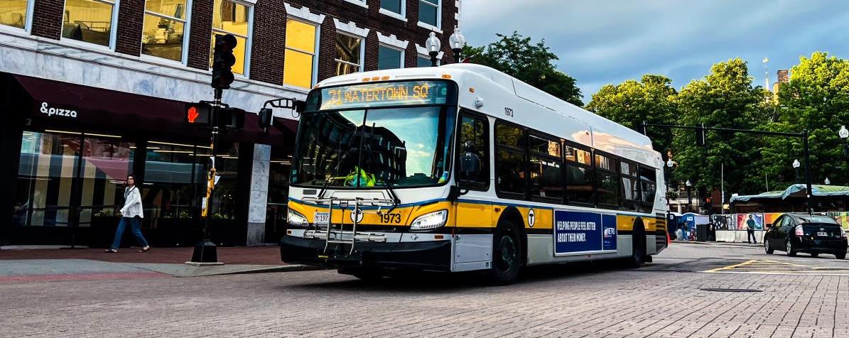 Massachusetts Bay Transportation Authority bus travelling through Harvard Square in July 2022.