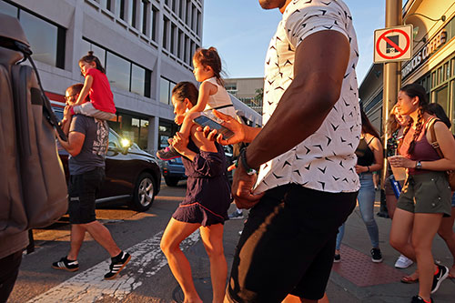 Karl Baden photo of people walking across "Massachusetts Avenue & Prospect Street 6.30.18"