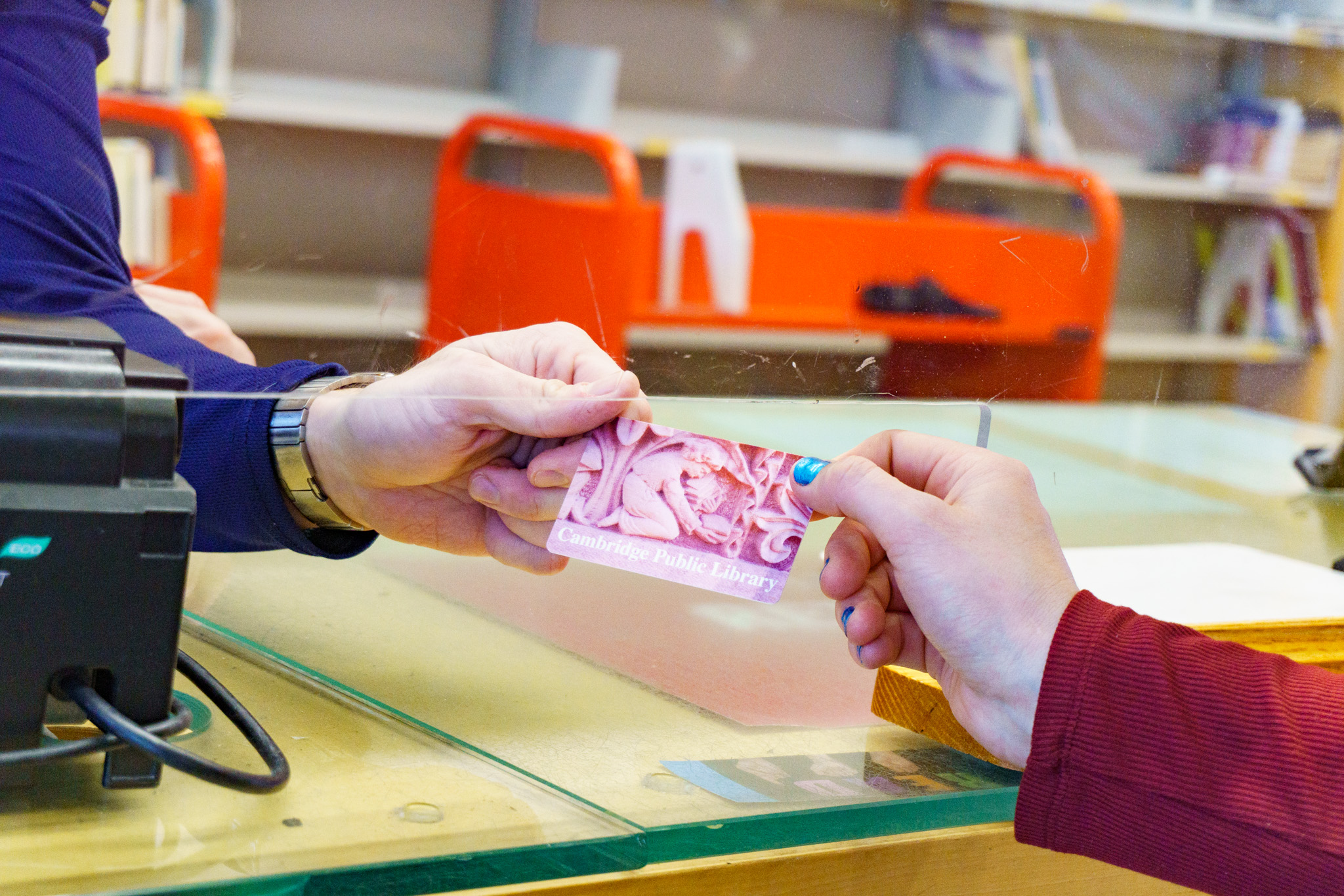 Handing Patron a Library Card