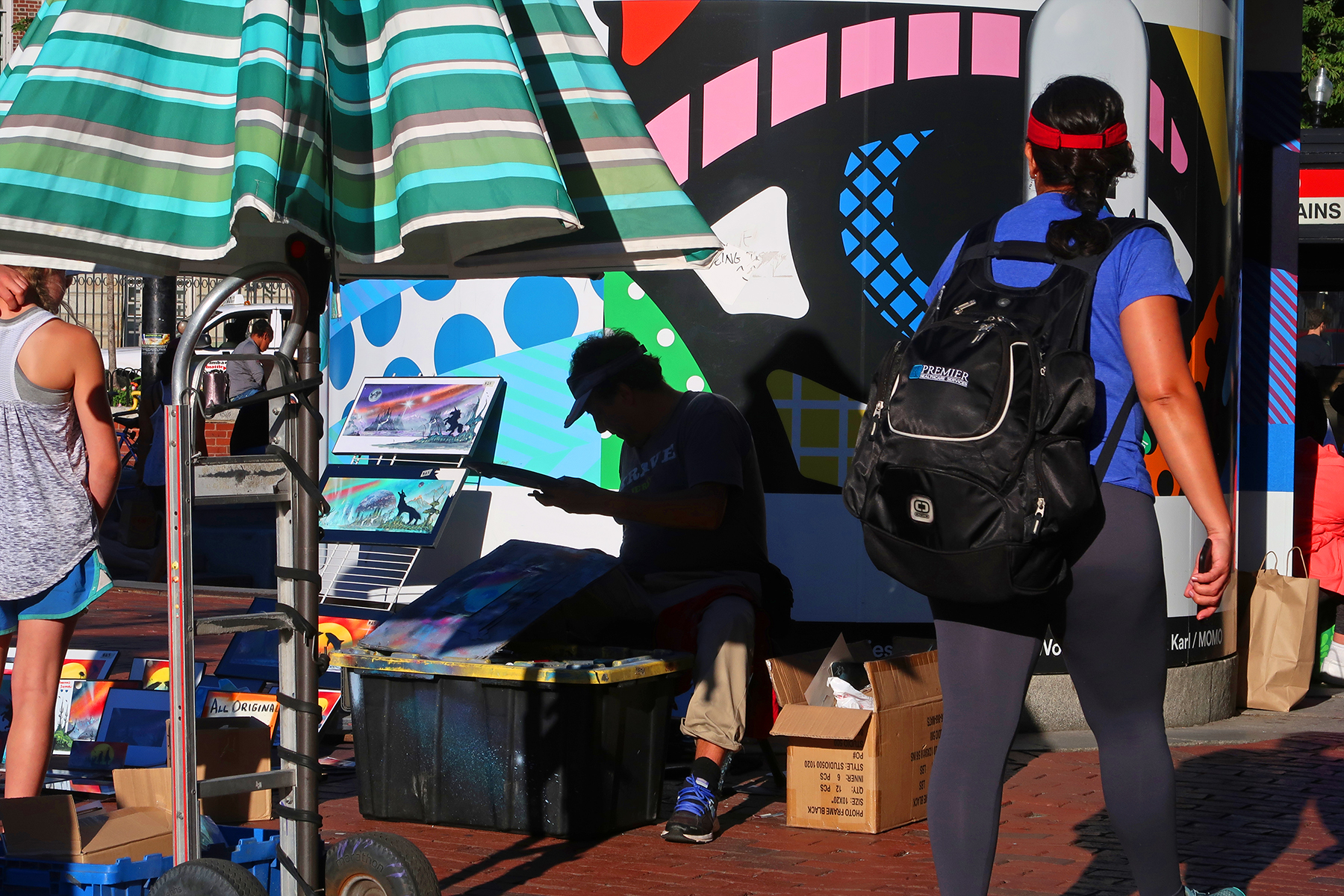 Mass Ave Project by Karl Baden with image of Street performer at Harvard Square